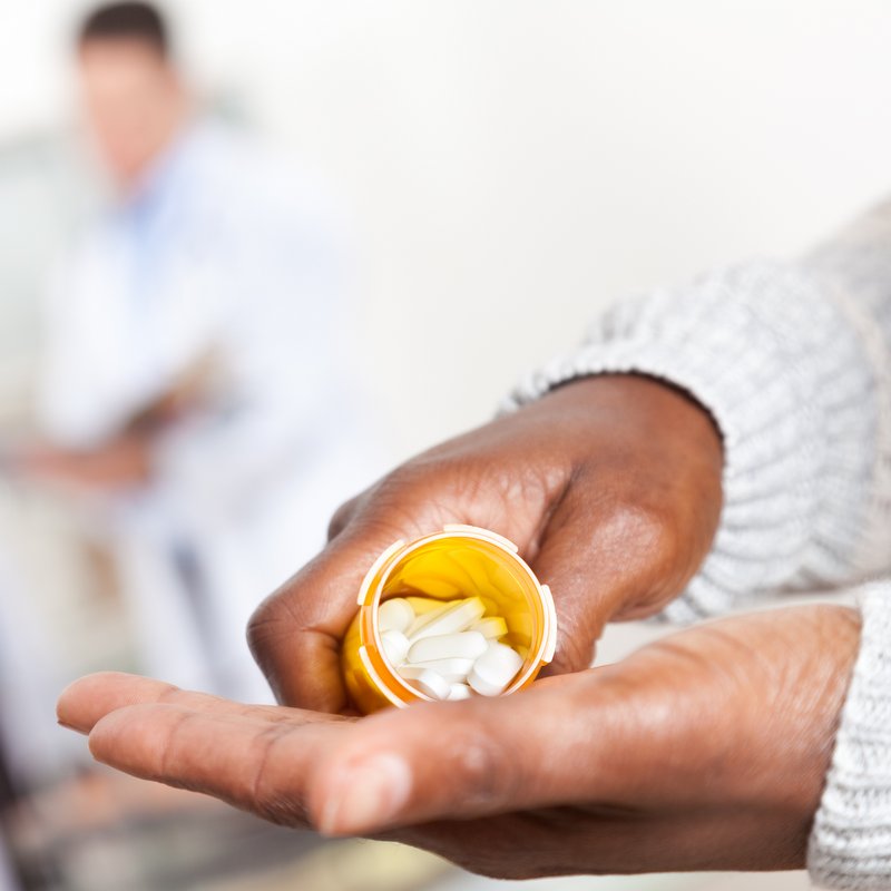 Woman pouring out medicine at the hospital